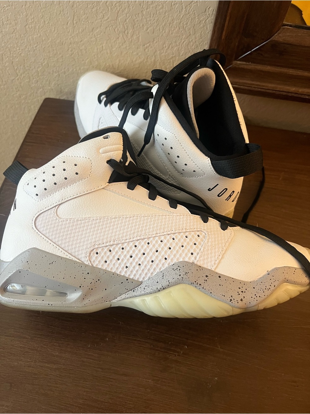 Jordan White and Black High-Top Basketball Sneakers